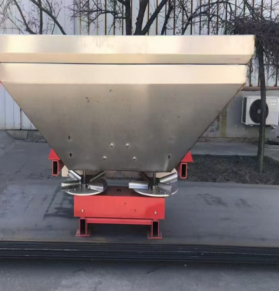 Suspended stainless steel fertilizer spreader