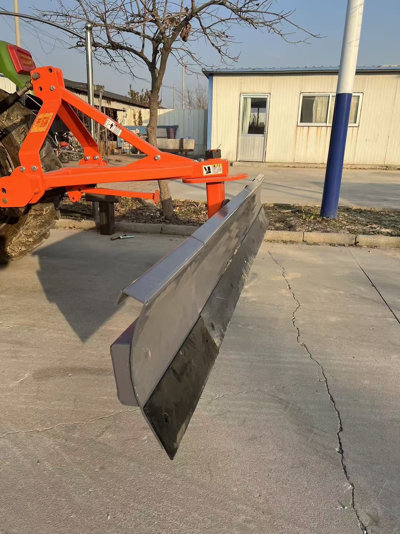 Three-point hitch scraper grader